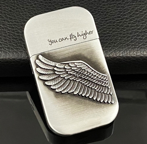 Personalized creative relief zinc-combined angel wing grinding wheel kerosene metal lighter