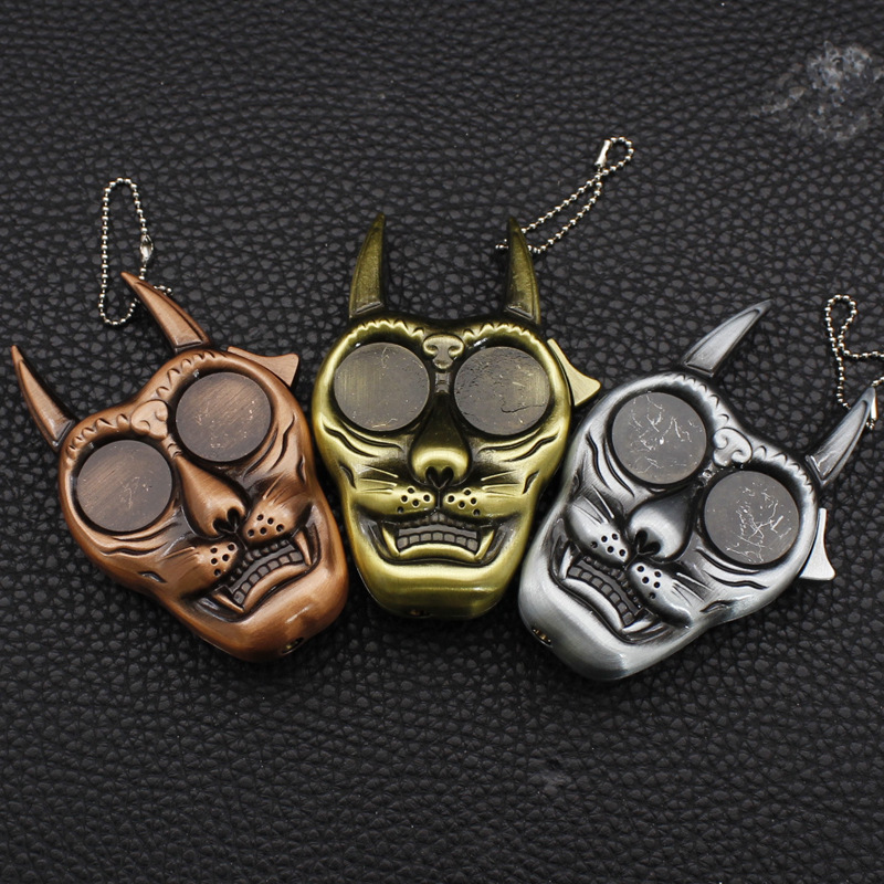 Creative skull styling windproof lighter metal keychain direct inflatable cigarette lighter wholesal
