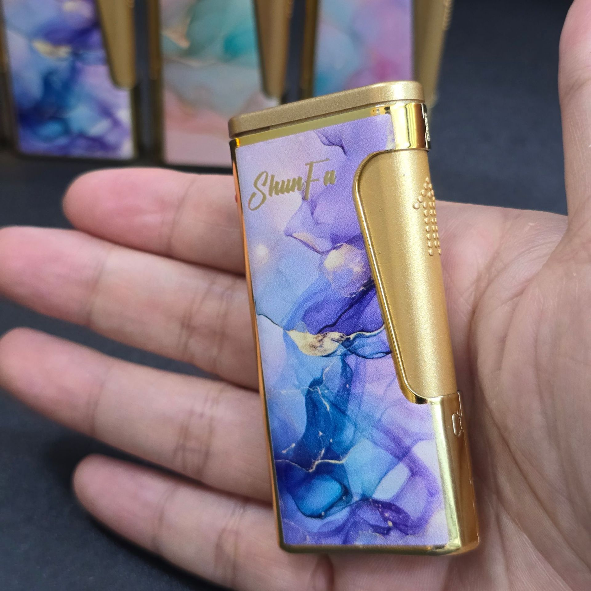 Inflatable side pressing iron shell lighter jet flame windproof gas wholesale